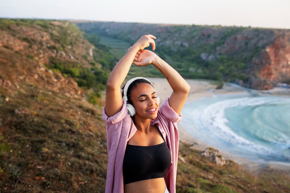 Young person outdoors, breathing calmly